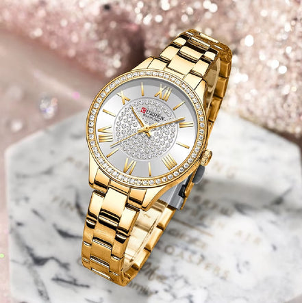 Reloj CURREN 9084 para mujer, dorado con esfera plateada