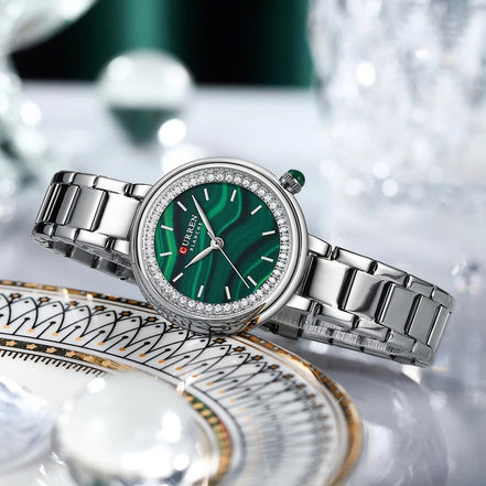 Reloj CURREN 9089 para mujer, variante plateado con esfera verde