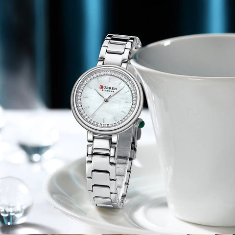 Reloj CURREN 9089 para mujer, variante plateado con esfera blanca